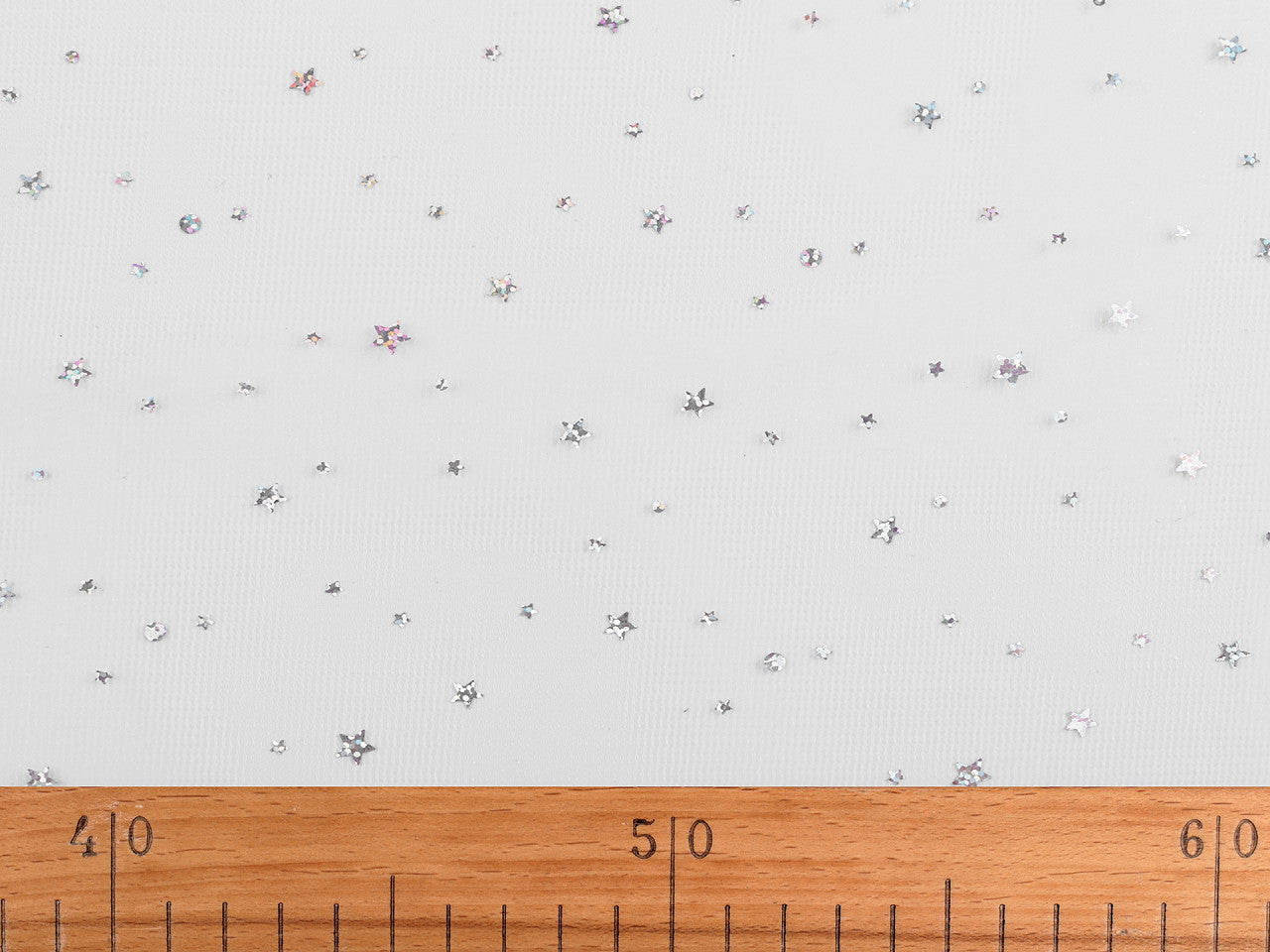 Tulle avec étoiles et hologramme - 1m
