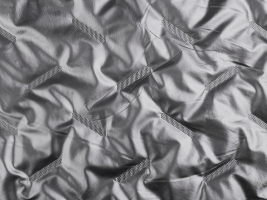 Tissu en polyester matelassé/surpiqué - 1m